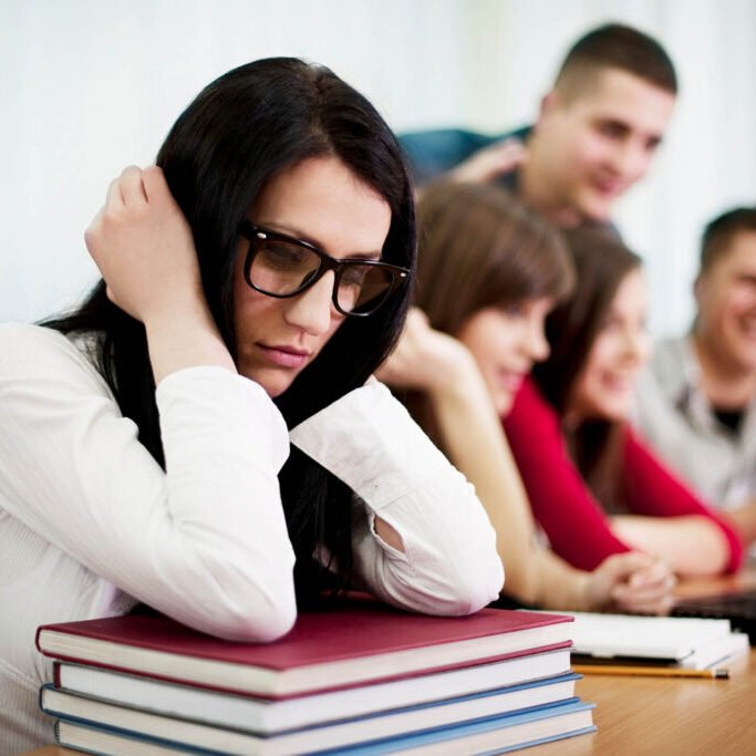 sad girl sitting in the class sad girl sitting in the class